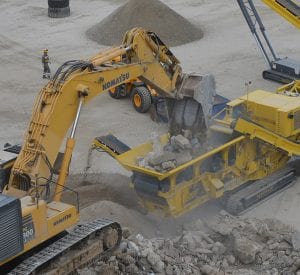 Keestrack R6 mobile track-mounted impact crusher crushing aggregate
