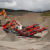 QH332 cone crusher processing aggregate at quarry.