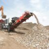 Sandvik mobile jaw crusher crushing aggregate.